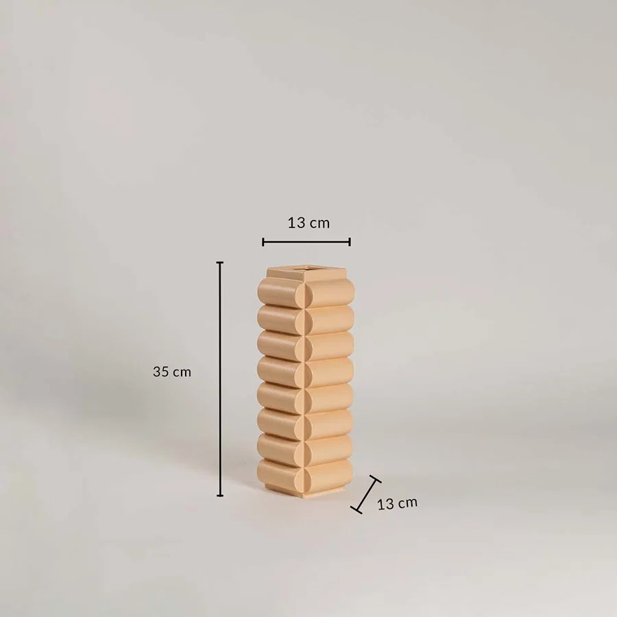 A beige geometric vase with measurements showing 35 cm height and 13 cm width clearly presenting its size and proportions for reference.