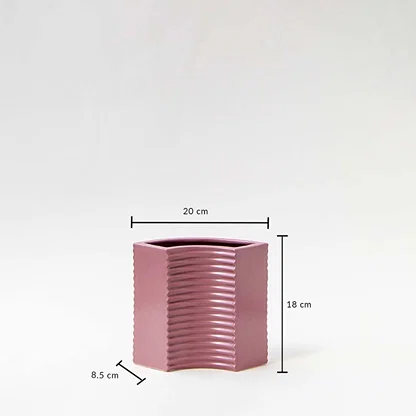 Mauve decorative vase shown with dimensions 18 cm height 20 cm width and 8.5 cm depth giving a clear view of its curved ribbed design and compact modern structure.