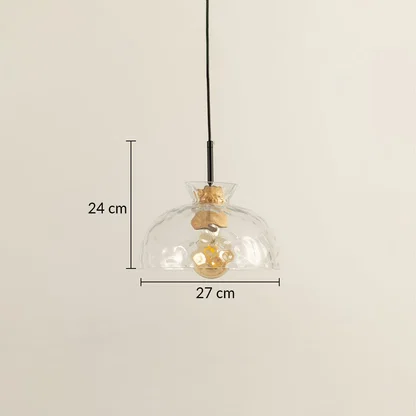Clear glass and brass pendant light dimension image with 27 cm width and 24 cm height for modern dining placement.