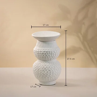 White ceramic vase on white background showing height 27 cm width 17 cm base 17 cm ideal for living room and console decor.