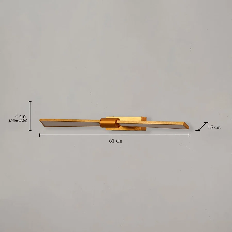 Gold metal picture light measuring 61 cm wide and 15 cm deep designed for illuminating paintings and framed artwork.