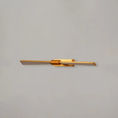 Gold metal picture light with sleek linear design for illuminating artwork mirrors and decorative wall displays.