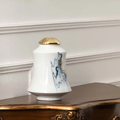 White ceramic jar with blue mountain and horse artwork in a front view perfect for classic console décor and decorative display styling.