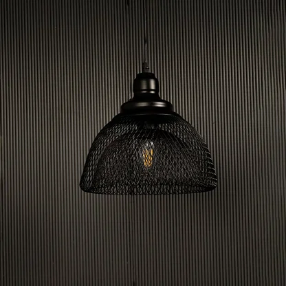 Modern industrial black mesh pendant light displayed on dark background with lights off showing contemporary artistic design.