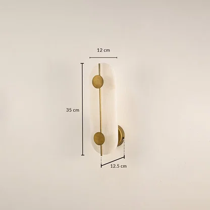 Marble gold wall light with 20 cm height 12 cm width and 12.5 cm depth for modern decor spaces.

