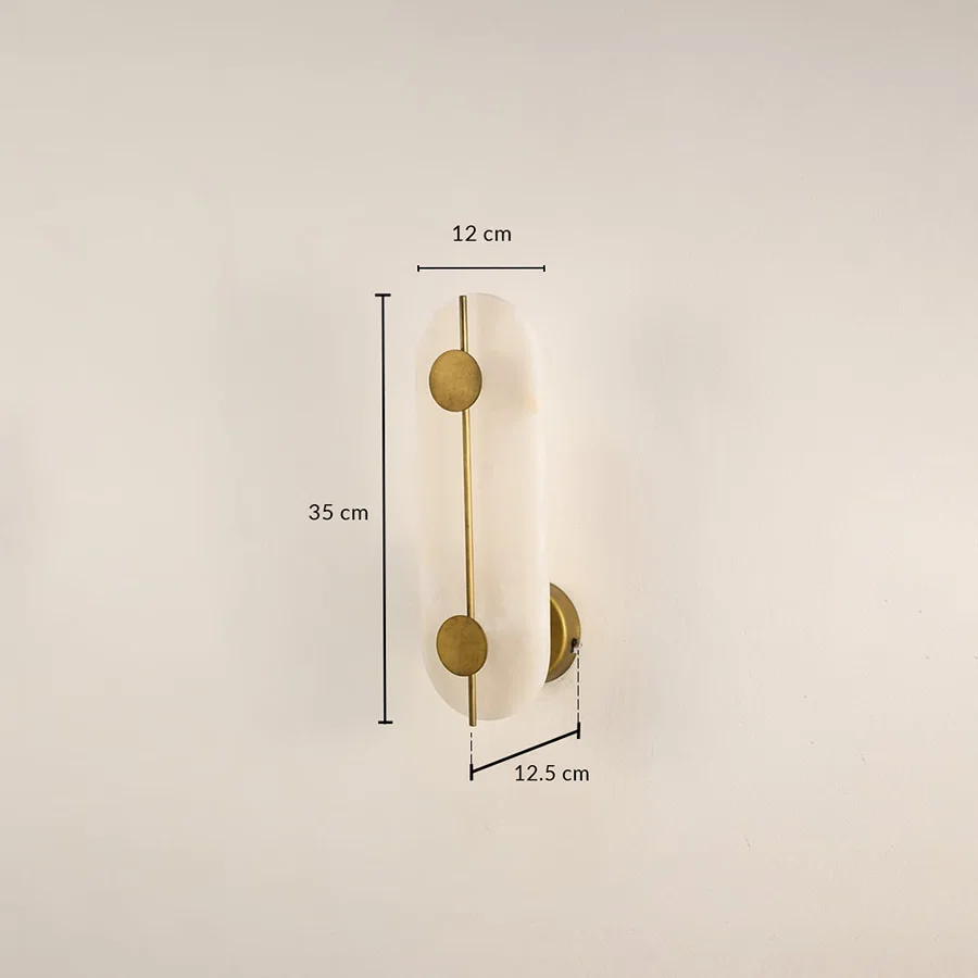 Marble gold wall light with 20 cm height 12 cm width and 12.5 cm depth for modern decor spaces.

