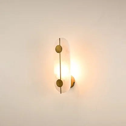 Modern marble wall light with warm ambient glow for elegant hallway and luxury decor styling spaces.
