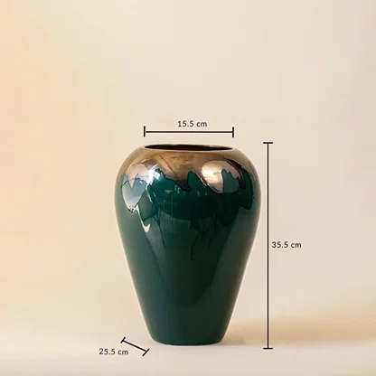Tall green vase with gold toned upper section shown with height and width measurements on a plain background.