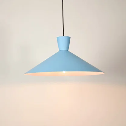 Blue metal pendant light illuminated to display contemporary ceiling lighting with sleek minimalist design appeal.