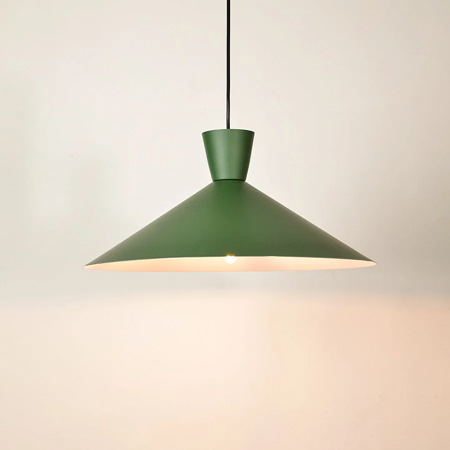 Green metal pendant light illuminated to display contemporary ceiling lighting with elegant minimalist design appeal.