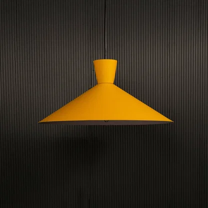 Yellow cone pendant light hanging against dark textured wall with light on for bright modern décor.