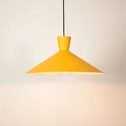 Yellow metal pendant light illuminated to showcase modern ceiling lighting with vibrant contemporary decorative appeal.