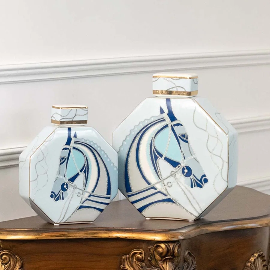 Pair of white octagon jars with blue abstract horse artwork in a front view perfect for artistic console décor and modern home styling.