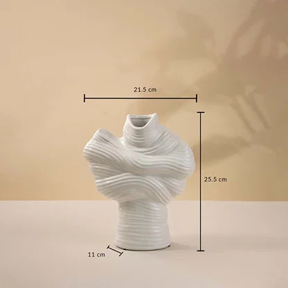 White ceramic sculptural vase shown with 25.5 cm height and 21.5 cm width measurement for elegant home decoration.
