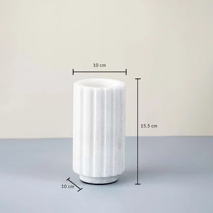 White marble vase with fluted cylindrical design shown with 15.5 cm height and 10 cm width ideal for modern home decor.