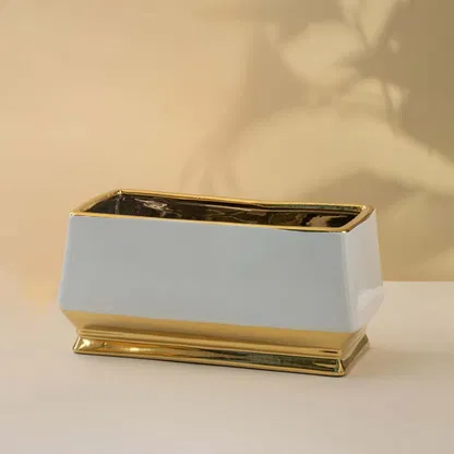 White marble decorative tray with gold frame for modern tabletop organization and sophisticated home decor styling.