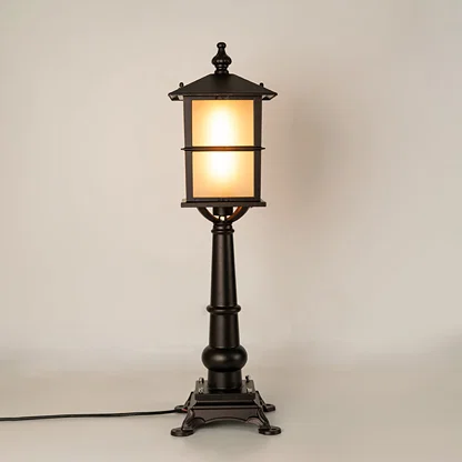 Vintage black outdoor garden light with warm glowing panels for luxury exterior decor styling use.