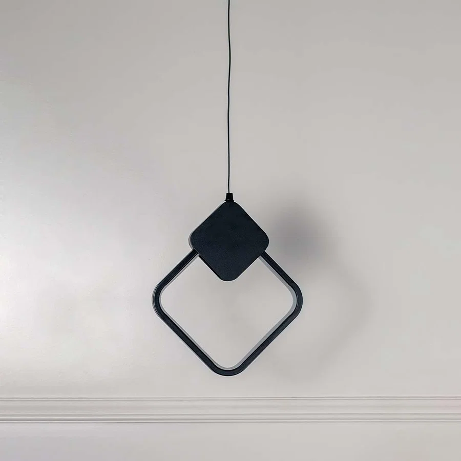 Minimalist black metal square ring pendant light designed for elegant modern living spaces.