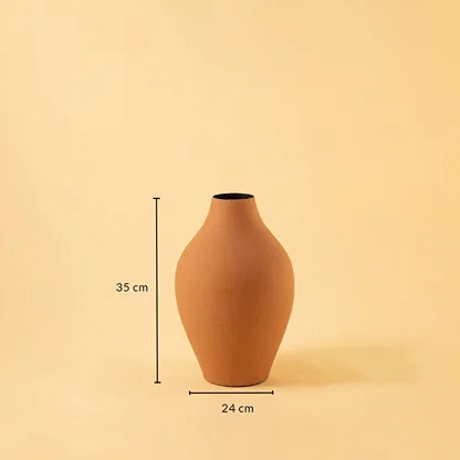 A terracotta curved vase shown against a soft backdrop with clear measurements displaying a height of 35 cm and a width of 24 cm to guide accurate sizing selection.