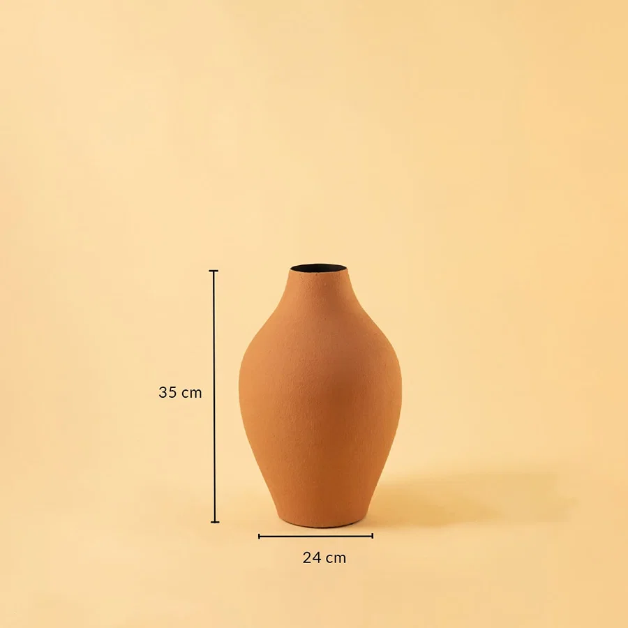 A terracotta curved vase shown against a soft backdrop with clear measurements displaying a height of 35 cm and a width of 24 cm to guide accurate sizing selection.