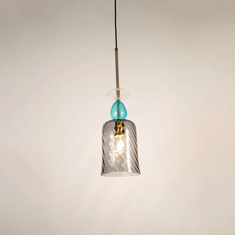 Blue and clear glass pendant light with decorative crystal accents for sophisticated contemporary ceiling lighting decor.
