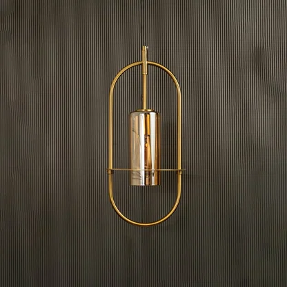 Unlit pendant lamp set against a dark backdrop revealing its modern oval silhouette and subtle metallic sheen.