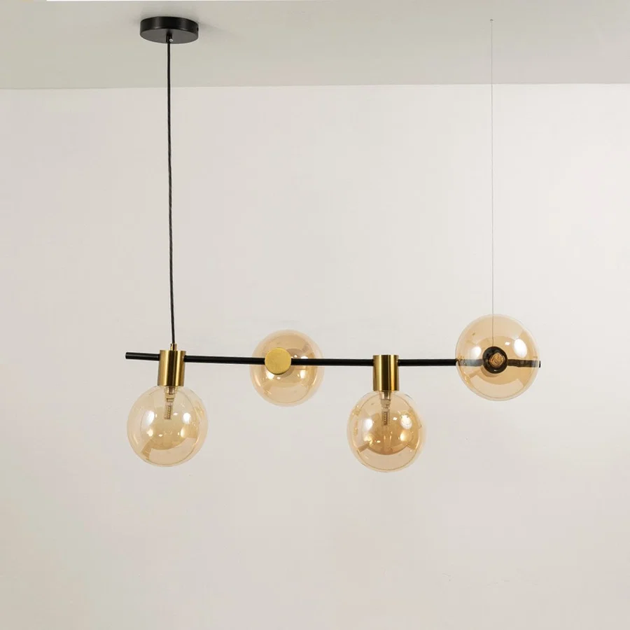 Amber glass chandelier displayed on white background with lights off showcasing geometric alignment and refined modern finish.