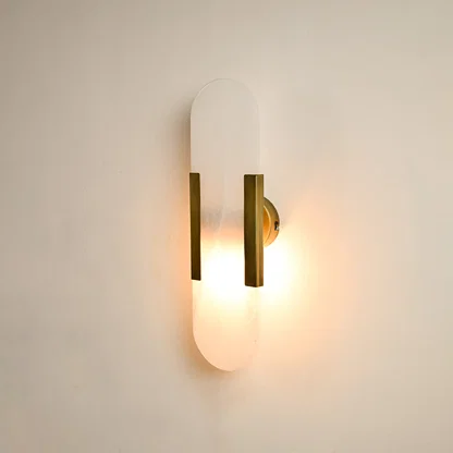 Modern marble and gold wall light with warm ambient glow for premium hallway and luxury decor spaces.

