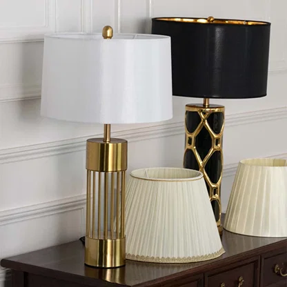 White shade gold metal table lamp on wooden console table with light off and white wall background for modern luxury home décor.