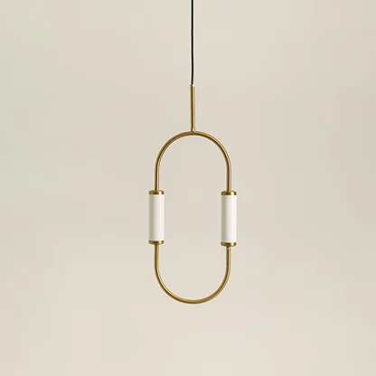 Gold metal wall light with frosted diffuser illuminated to showcase elegant modern decorative wall lighting design.