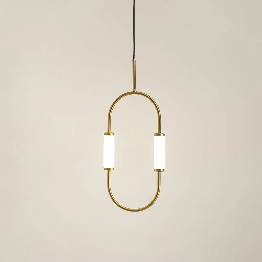 Gold metal hanging pendant light with oval frame and white shades on white background perfect for modern dining and living decor.