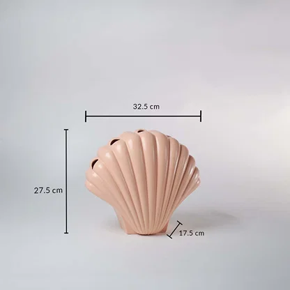 Peach ceramic shell vase shown with dimensions 32.5 cm width 27.5 cm height and 17.5 cm depth to clearly display its overall size.