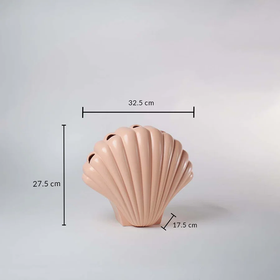 Peach ceramic shell vase shown with dimensions 32.5 cm width 27.5 cm height and 17.5 cm depth to clearly display its overall size.