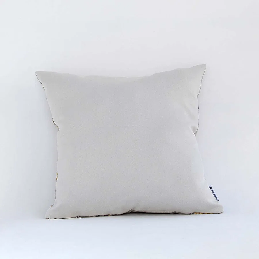 Back side view of white floral cushion cover showing neat stitching smooth fabric finish and concealed closure.