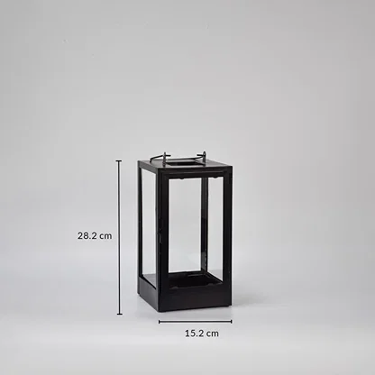 Rectangular black metal lantern displaying 35 cm height 15 cm width and 15 cm depth ideal for indoor or outdoor decorative lighting use.