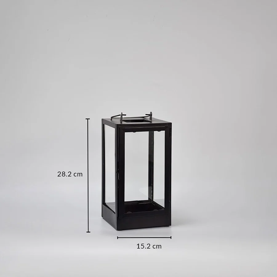 Rectangular black metal lantern displaying 35 cm height 15 cm width and 15 cm depth ideal for indoor or outdoor decorative lighting use.
