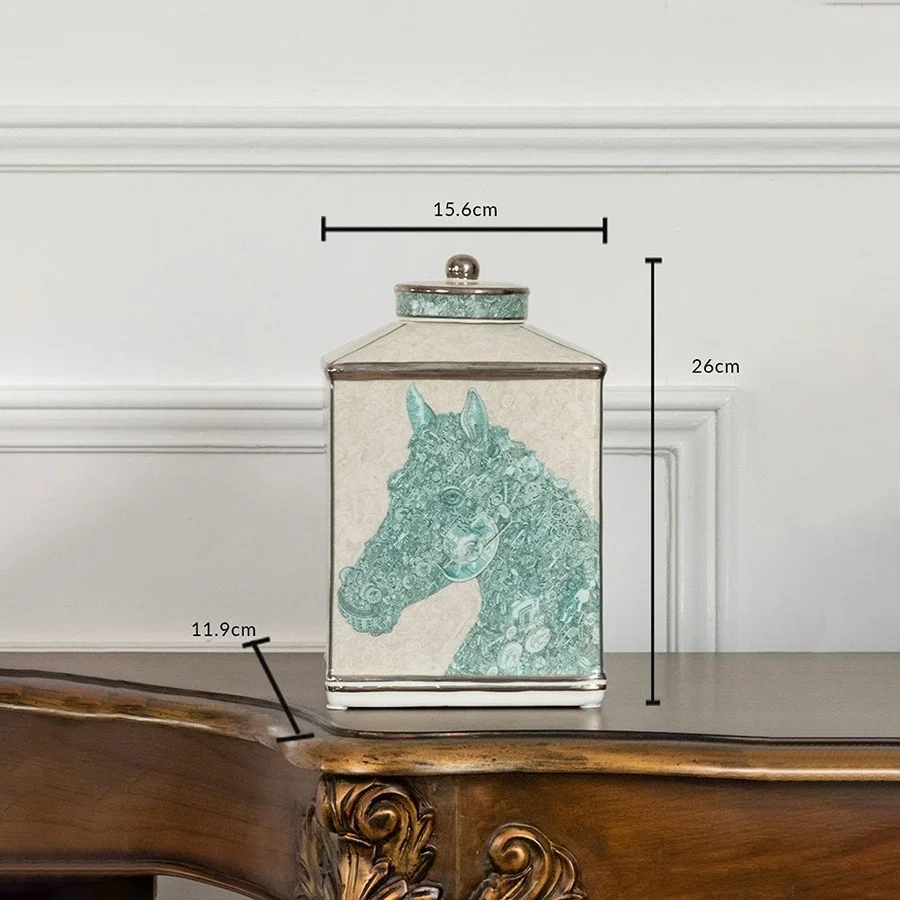 White square ceramic jar with green horse silhouette in a front view measuring 19.5 cm width and 29 cm height ideal for contemporary décor.