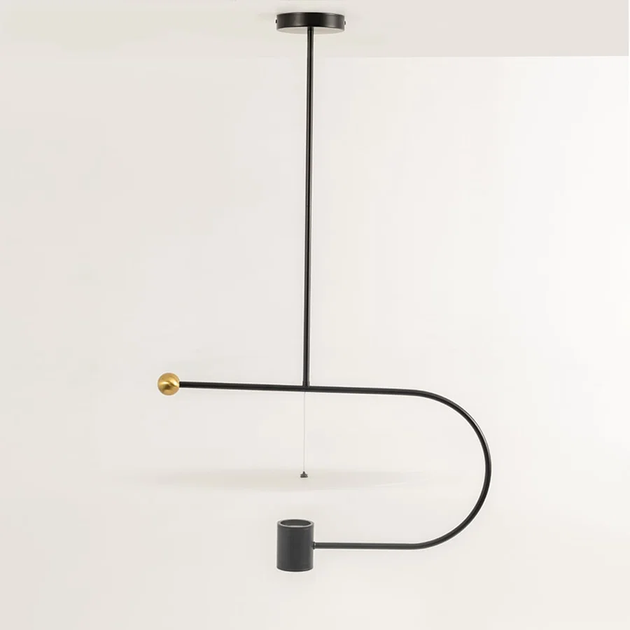 Black metal pendant light with curved arm design showcasing minimalist decorative lighting and contemporary styling.
