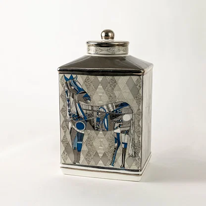 Ceramic jar with detailed blue equestrian artwork shown in a closeup view highlighting fine brush detailing premium craftsmanship and artistic décor suitable for elegant luxury home styling.