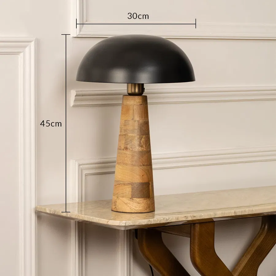 Black dome shade wooden cone table lamp with size 38cm width and 45cm height on wall shelf with light on for artistic modern décor.