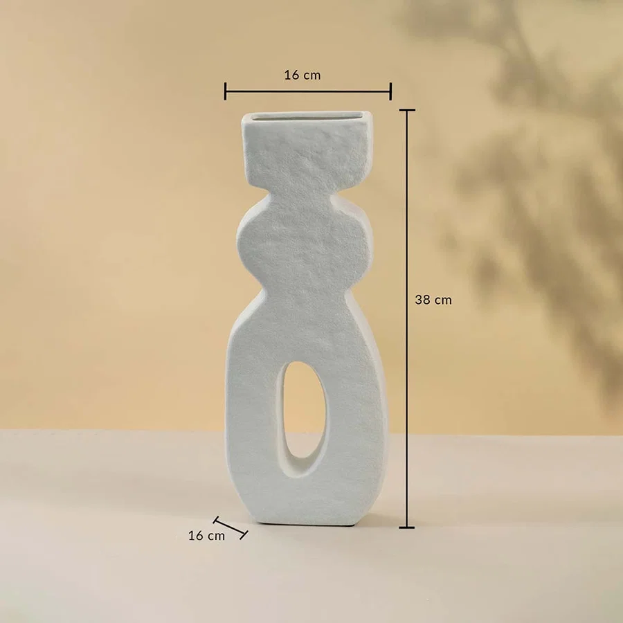 White sculptural ceramic vase measuring 38 cm in height and 16 cm in width shown with clear dimensions.
