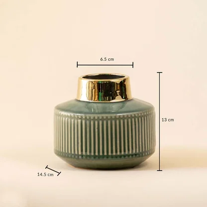 Compact ceramic decor vase shown with measurements highlighting 13 cm height 14.5 cm width and 6.5 cm opening for accurate size reference.