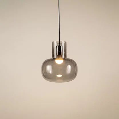 Smoke glass pendant light with black metal fixture showcasing modern ceiling lighting and elegant contemporary design.