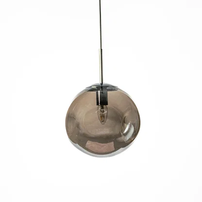 Smoky glass pendant light with reflective metal finish designed for modern living and dining areas.
