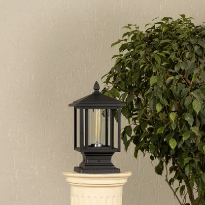 Black outdoor pillar lantern Light Off White Background image showing ribbed glass and a clean metal cap design.