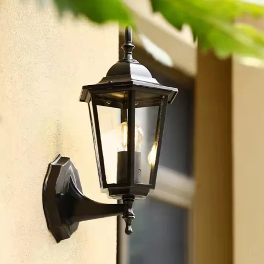 Black metal outdoor lantern wall light lifestyle image for elegant exterior gate and patio lighting decor.