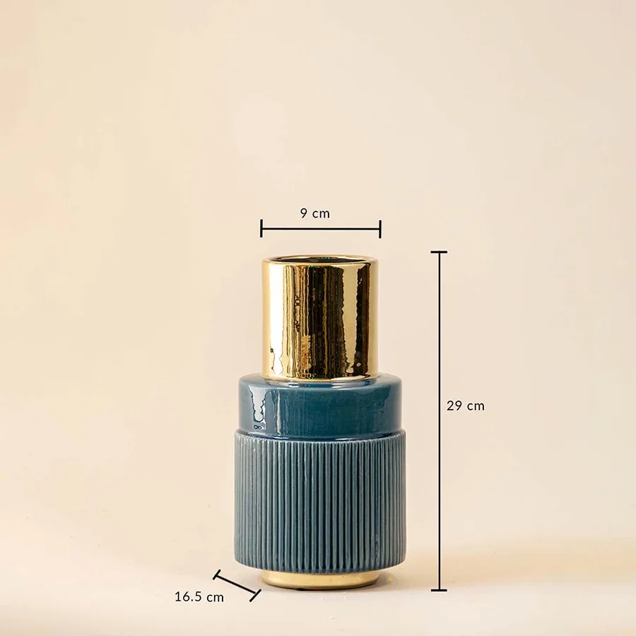 Blue ribbed ceramic vase with gold neck featuring 29 cm height 16.5 cm base width and 9 cm top diameter.
