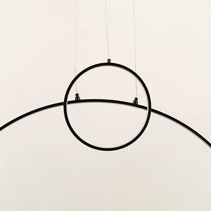 A modern black ring ceiling light featuring a clean curved bar ideal for minimal LED lighting and contemporary designer ceiling décor in stylish interiors.