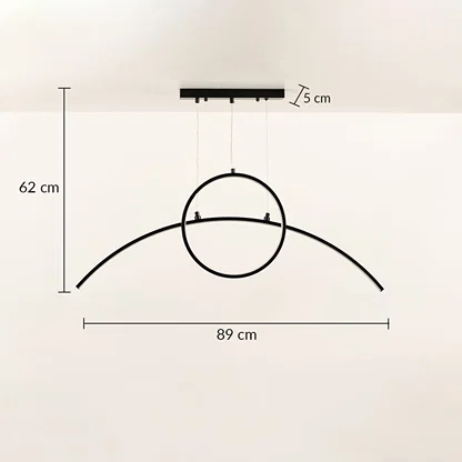A modern black ring ceiling light with curved bar shown with 42 cm height and 120 cm width ideal for LED chandelier lighting and minimal contemporary décor.