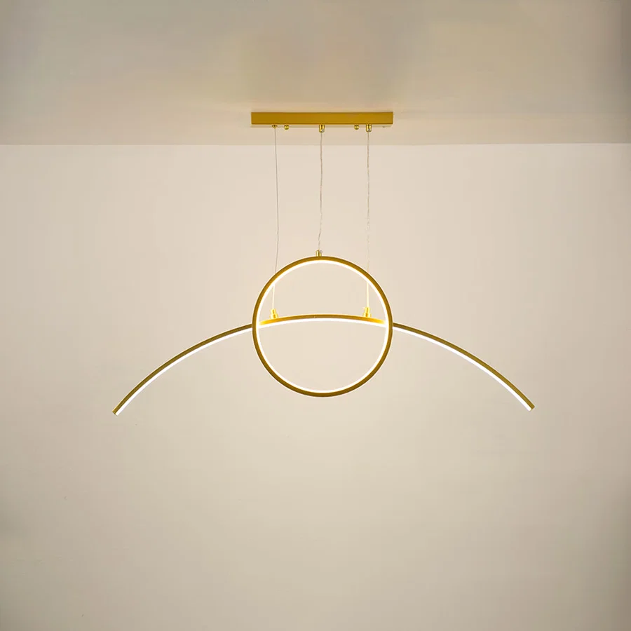 Gold metal circular LED pendant light with integrated illumination creating elegant modern ambient ceiling lighting.